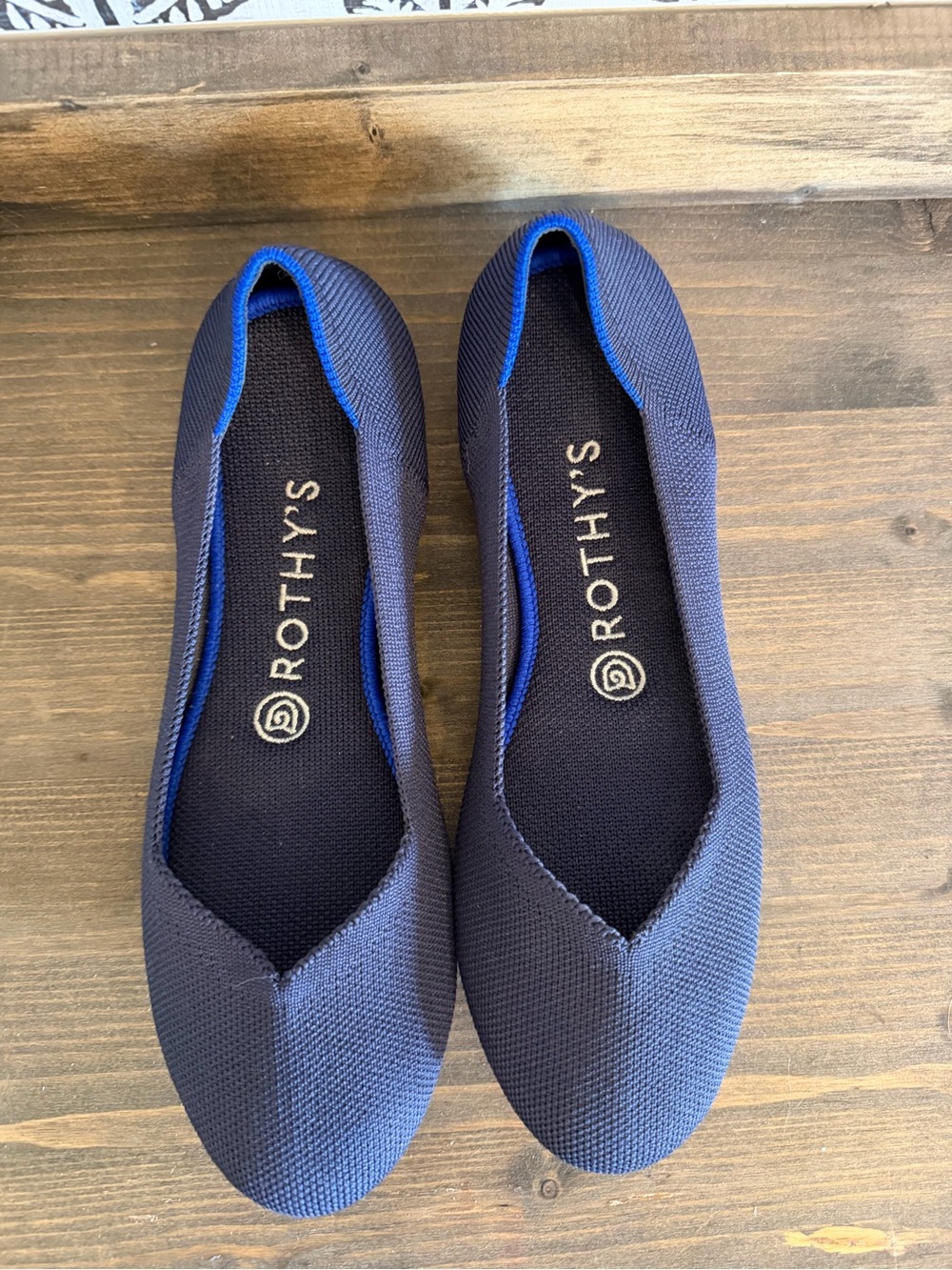 Navy Blue Rothy’s round toe flats size 8